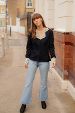 Anita is Vintage 90s Black Blouse With Cream Lace