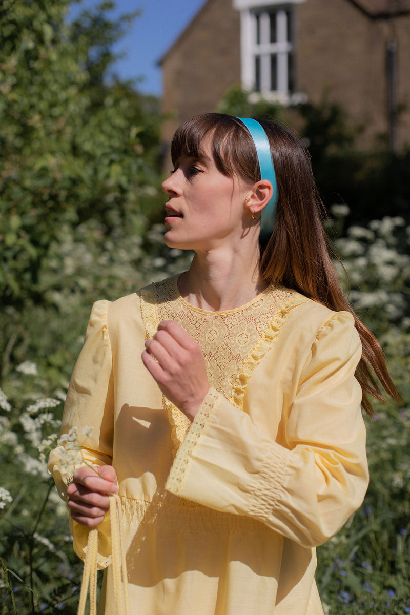 Anita is Vintage 60s Yellow Lace Long Sleeve Mini Dress