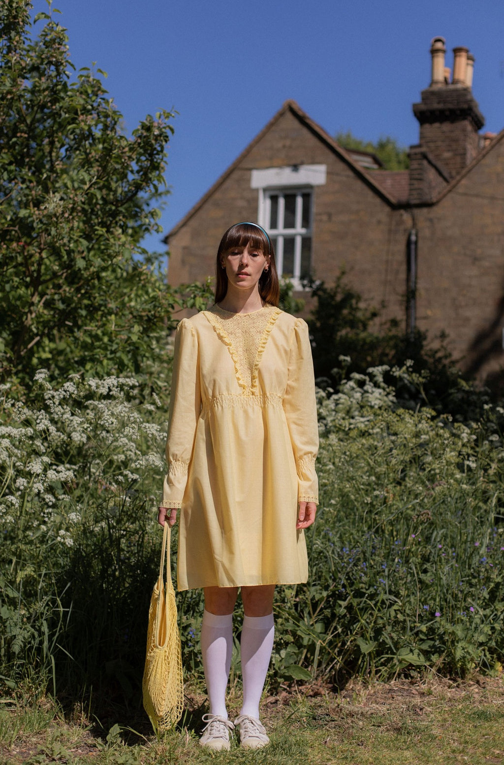 Anita is Vintage 60s Yellow Lace Long Sleeve Mini Dress