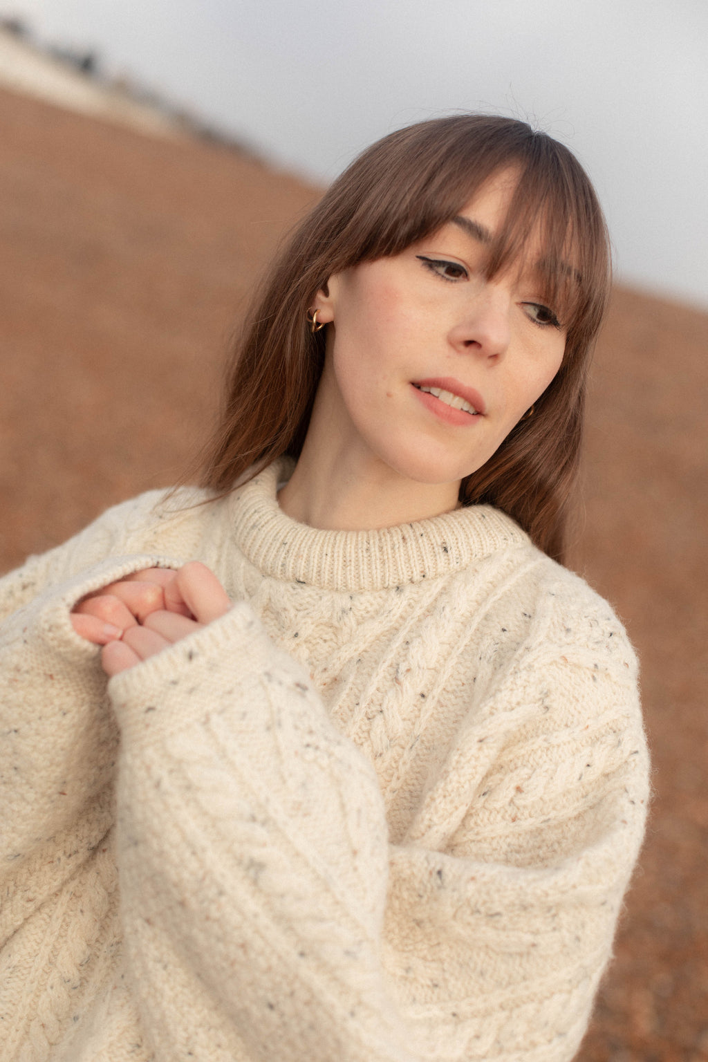 Anita is Vintage 90s Cream Speckled Wool Cable Knit Aran Jumper